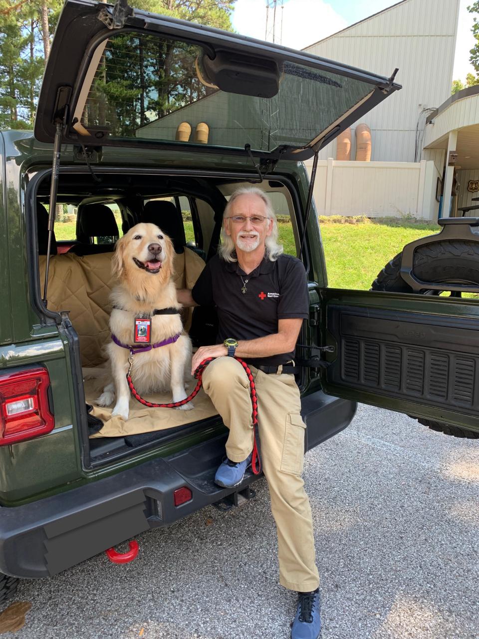 Walter Roberts Jr. with one of their therapy dogs, Tchoupitoulas Rose (aka, "Choppy" for short), preparing to visit Potosi Correctional Center in Missouri to work with incarcerated veterans.