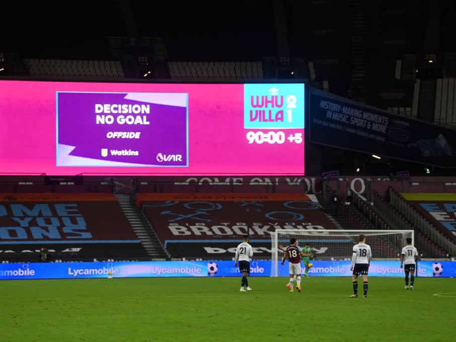 The big screen shows the VAR decision on Ollie Watkins’ goal (Getty)