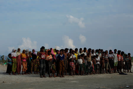 Rohingya Muslims wait to cross the border to Bangladesh, in a temporary camp outside Maungdaw, northern Rakhine state, Myanmar November 12, 2017. REUTERS/Wa Lone/Files