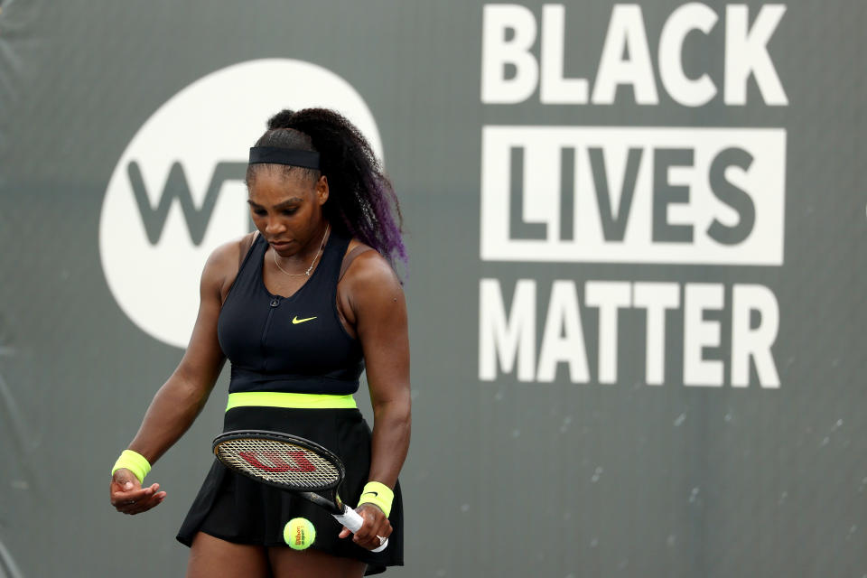 Serena Williams prepares to serve during her match.