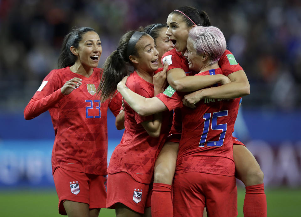 United States' Alex Morgan, second right, celebrates after scoring her side's 12th goal during the Women's World Cup Group F soccer match between United States and Thailand at the Stade Auguste-Delaune in Reims, France, Tuesday, June 11, 2019. Morgan scored five goals during the match. (AP Photo/Alessandra Tarantino)