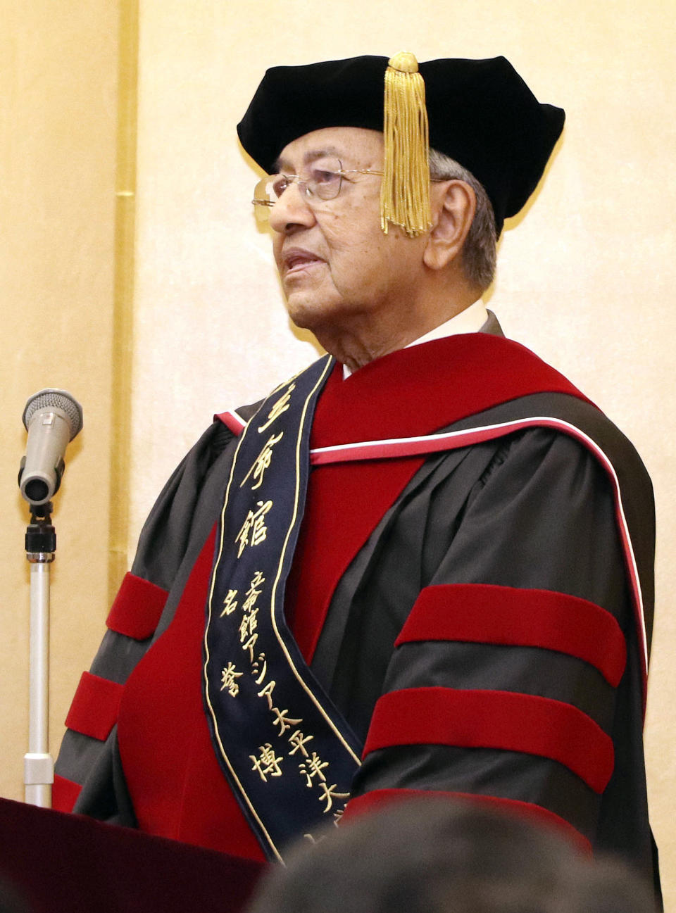 Malaysia's Prime Minister Mahathir Mohamad visits Ritsumeikan Asia Pacific University in Beppu, Oita prefecture, southern Japan Thursday, Aug. 9, 2018. Malaysia's leader called Thursday for more international exchange among young people as a way to prevent war and terrorism, as he received an honorary degree from the like-minded university in Japan. (Eri Shinagawa/Kyodo News via AP)