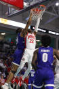 Ohio State guard Malachi Branham (22) drives past Seton Hall center Ike Obiagu (21) to the basket during the second half of an NCAA college basketball game Monday, Nov. 22, 2021, in Fort Myers, Fla. (AP Photo/Scott Audette)