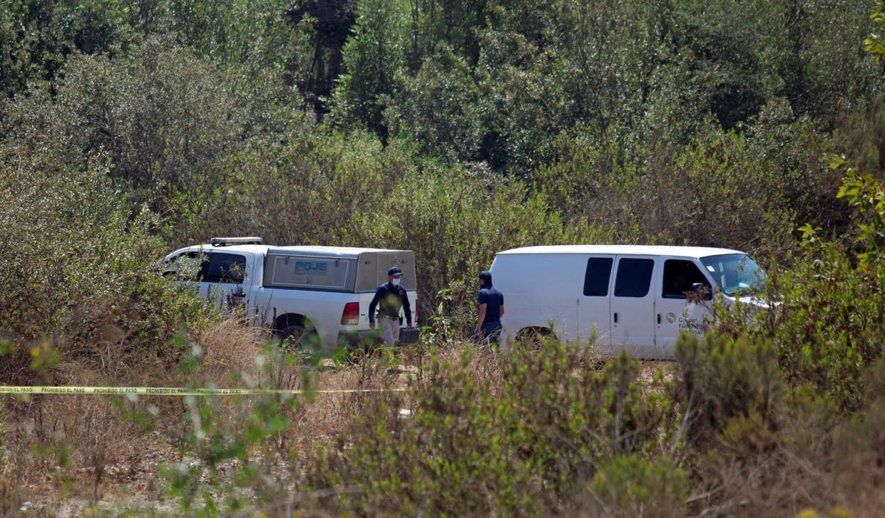 Image: Forensic technicians work at the scene where two American children were found dead in Rosarito (Reuters)
