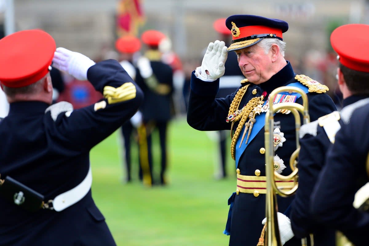 The Prince of Wales salutes during a consecration service at Bramham Park (Richard Martin-Roberts/PA) (PA Wire)