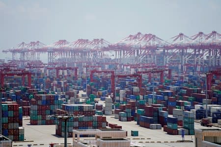 Containers are seen at the Yangshan Deep Water Port in Shanghai