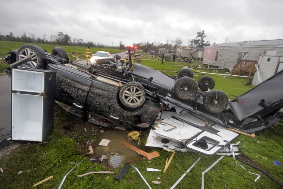 Damage is seen along Schoolhouse Road after a tornado moved through area in Killona, La., Wednesday, Dec. 14, 2022. (Brett Duke/The Times-Picayune/The New Orleans Advocate via AP)