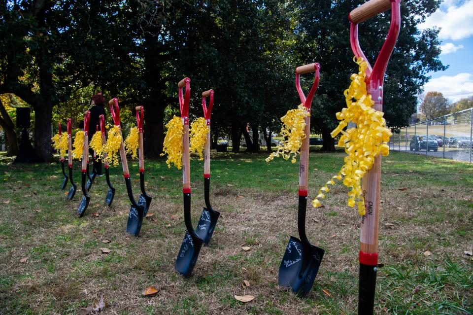 A line of shovles with the names of family members and friends of children who were lost to violence, commemorating a new ChildrenÕs Memory Garden of Nashville in Centennial Park, Saturday, November 13, 2021. 