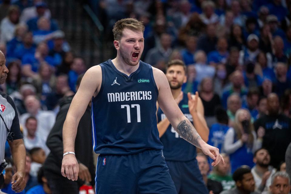 First round: The Dallas Mavericks' Luka Doncic celebrates during his team's Game 4 win over the Utah Jazz.