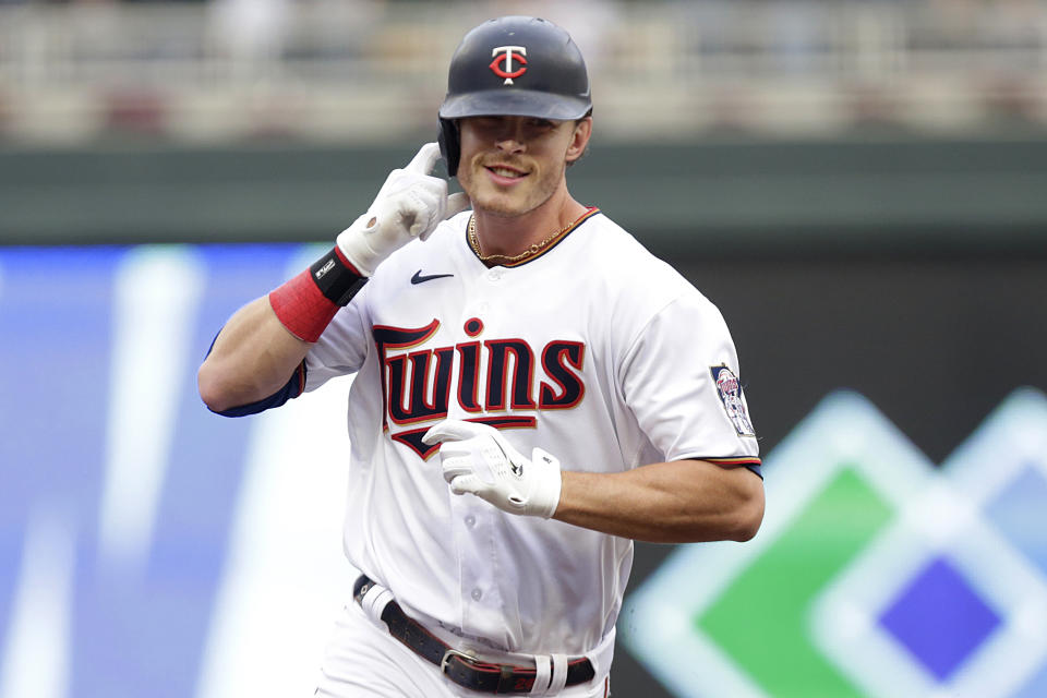 Minnesota Twins' Max Kepler rounds the bases after hitting a grand slam against the Detroit Tigers in the first inning of a baseball game Monday, May 23, 2022, in Minneapolis. (AP Photo/Andy Clayton-King)