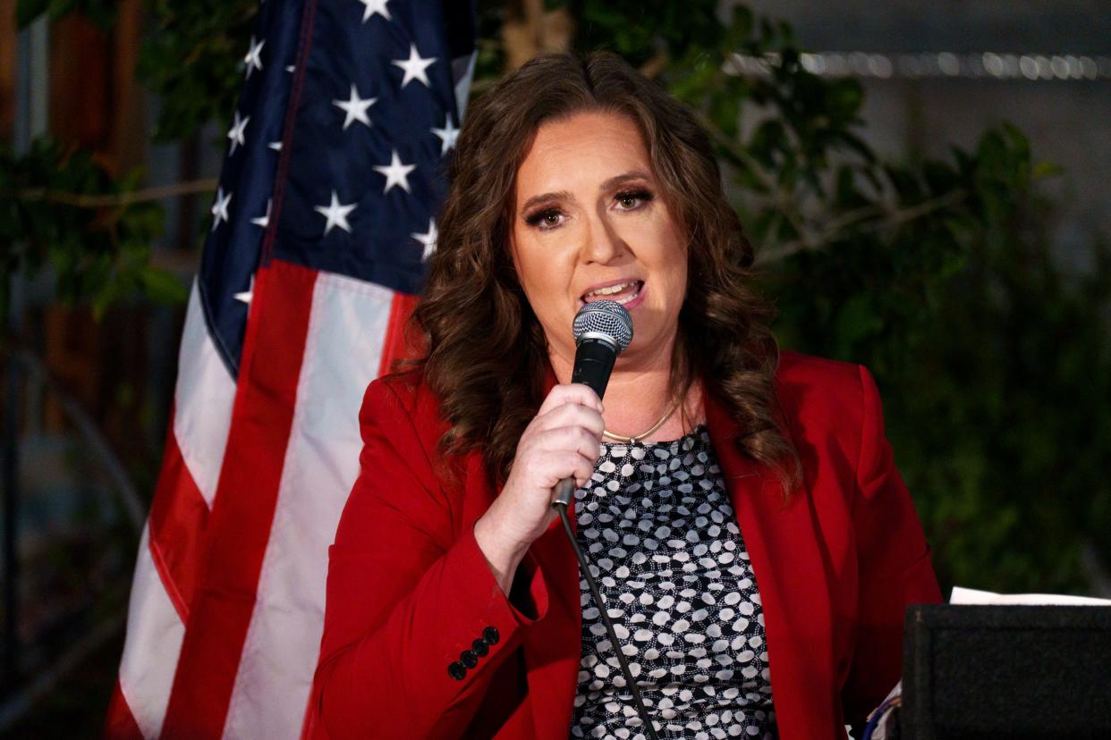 Liz Harris expresses her concerns about fraudulent ballots during Blake Masters' election integrity event at American Way Smokehouse on April 30, 2022, in Chandler.