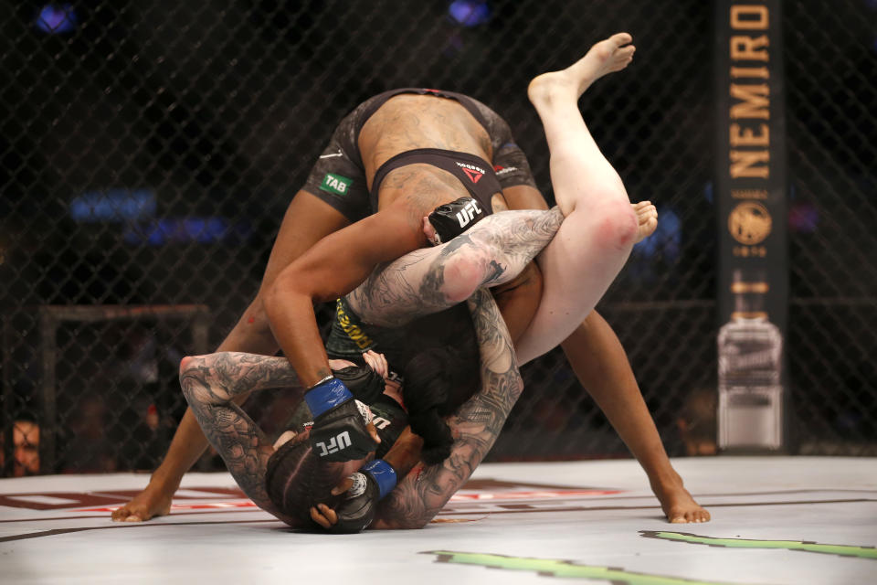 MELBOURNE, AUSTRALIA - OCTOBER 06: Megan Anderson of Australia and Zarah Fairn of France fight nin the Women's featherweight bout during UFC 243 at Marvel Stadium on October 06, 2019 in Melbourne, Australia. (Photo by Darrian Traynor/Getty Images)