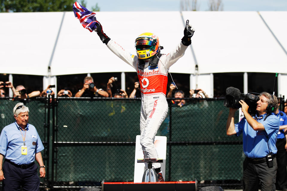 MONTREAL, CANADA - JUNE 10: Lewis Hamilton of Great Britain and McLaren celebrates in parc ferme after winning the Canadian Formula One Grand Prix at the Circuit Gilles Villeneuve on June 10, 2012 in Montreal, Canada. (Photo by Paul Gilham/Getty Images)