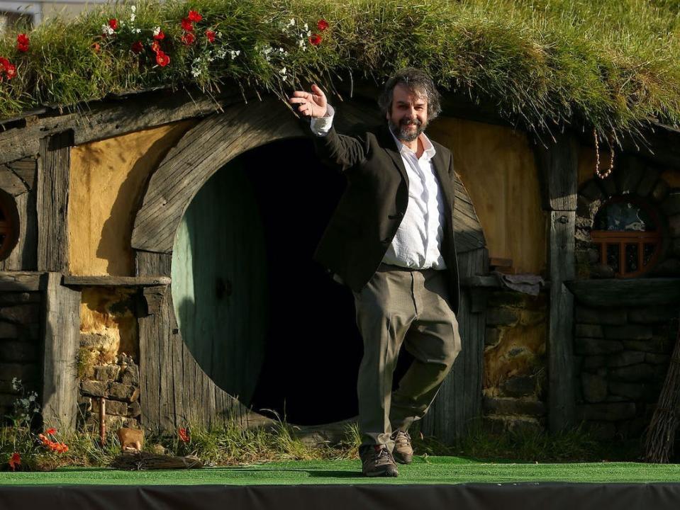 Director Peter Jackson emerges from from a Hobbit house in 2012.