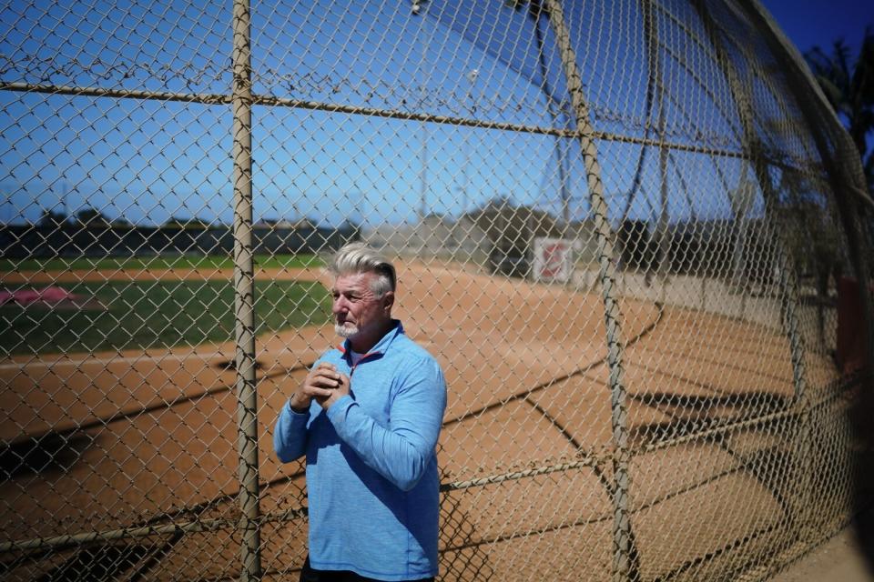 Bernard "Benny" Gallo stands at ballfield at Paul Ecke Sports Park.