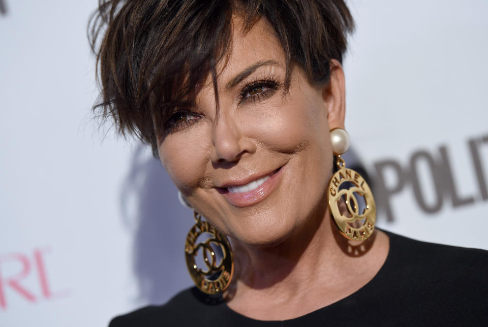 Kris Jenner rocking some Chanel earrings at Cosmopolitan magazine's 50th birthday celebration in 2015 in West Hollywood, California. (Photo: Axelle/Bauer-Griffin via Getty Images)