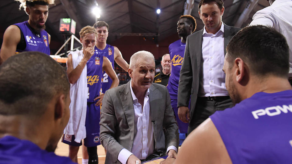 Andrew Gaze speaks to his players during a timeout. (Photo by Albert Perez/Getty Images)