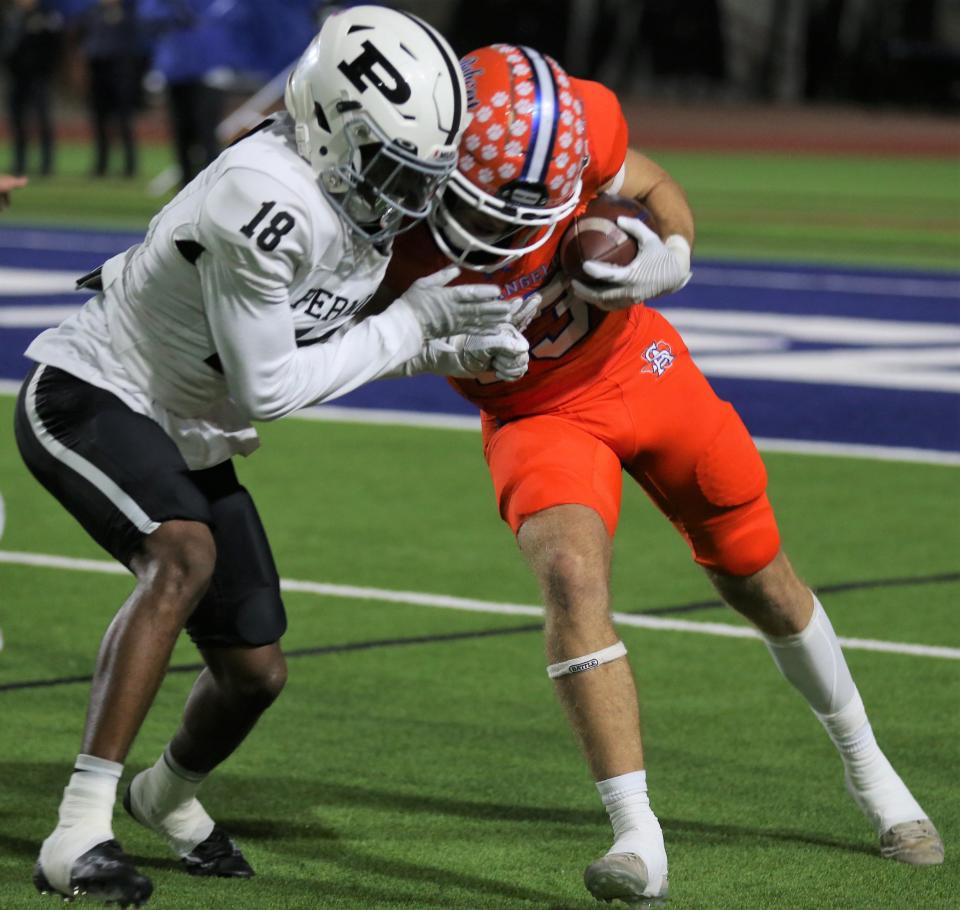 San Angelo Central High School receiver Ben Imler, right, gets hit after making a reception against Odessa Permian at San Angelo Stadium on Friday, Oct. 28, 2022.