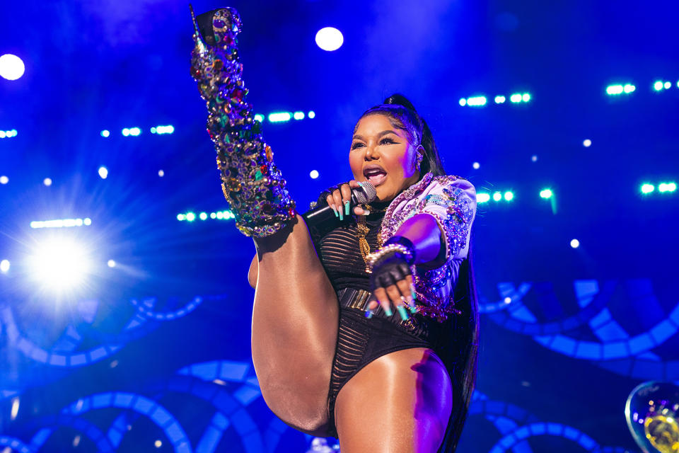 <p>Lil' Kim kicks off a performance with The Roots during the 2022 Essence Festival of Culture at the Louisiana Superdome on July 3 in New Orleans.</p>