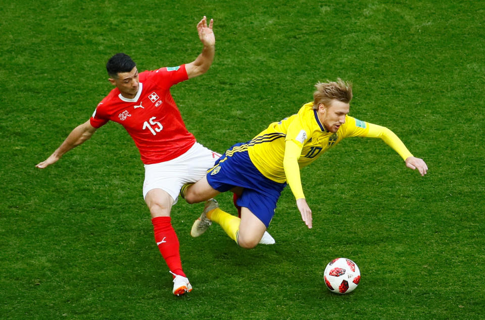 <p>Switzerland’s Blerim Dzemaili in action with Sweden’s Emil Forsberg REUTERS/Jason Cairnduff </p>