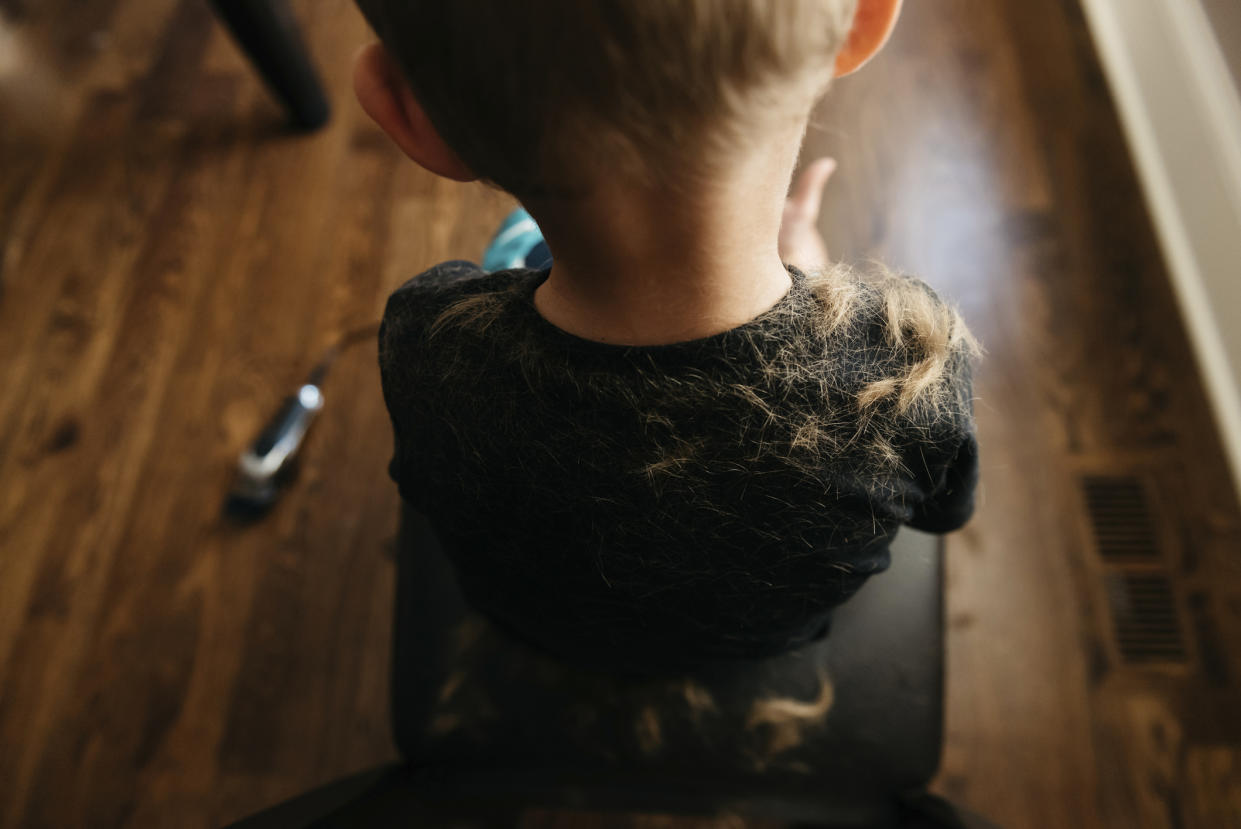 A boy has given his sister and brother a haircut with an electric razor, with hilarious results [Photo: Getty]