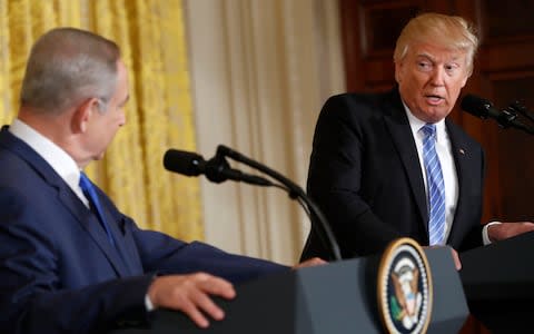 Donald Trump giving a joint press conference with PM Netanyahu - Credit: AP