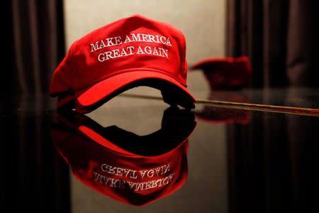 A Trump hat sits on a table outside of the rally for Republican U.S. presidential nominee Donald Trump in New York City, New York, U.S. November 8, 2016. REUTERS/Andrew Kelly/Files