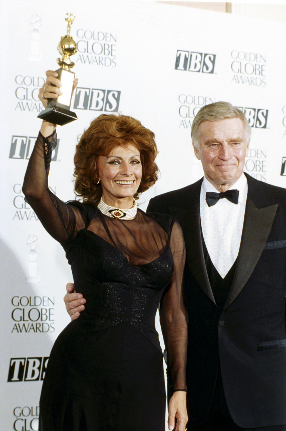 <span><span>Sophia Loren poses with Charlton Heston at the 1995 Golden Globe Awards where she won the Cecil B. deMille Award</span><span>Jean Cummings/THA/Shutterstock</span></span>
