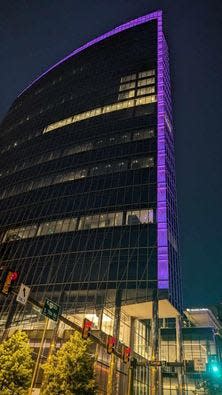 Dominion Energy building in Richmond illuminated purple for fentanyl awareness on May 7-9, 2024.