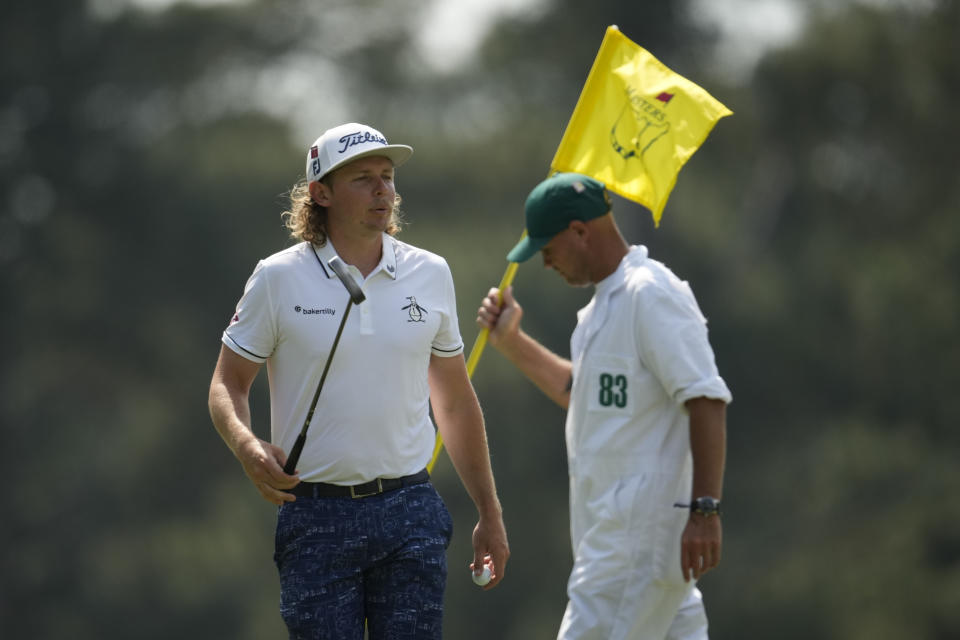 Cameron Smith, of Australia, waves after making a putt on the third hole during the first round of the Masters golf tournament at Augusta National Golf Club on Thursday, April 6, 2023, in Augusta, Ga. (AP Photo/Matt Slocum)