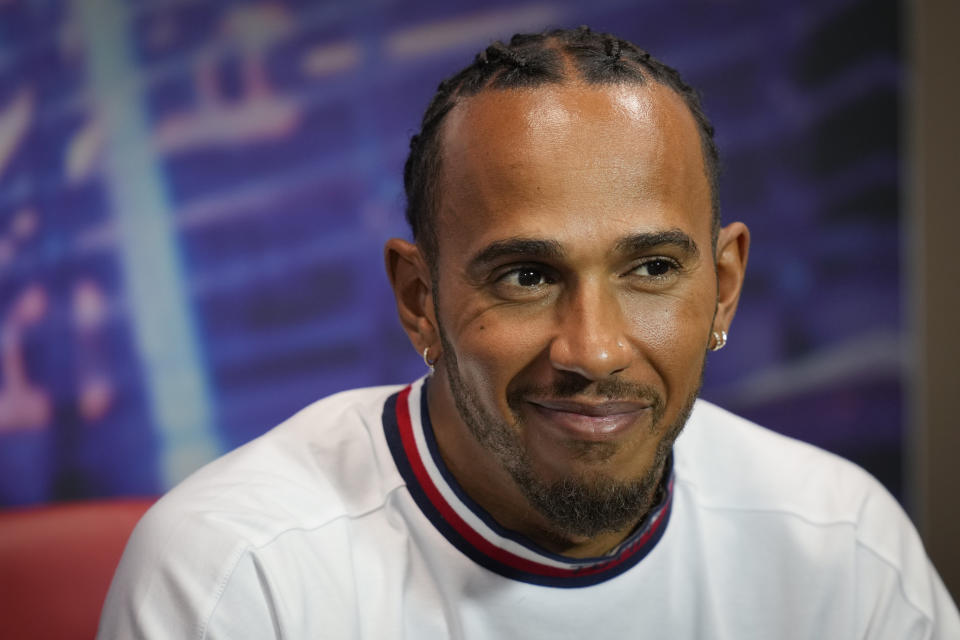 Mercedes driver Lewis Hamilton of Britain speaks during the drivers press conference at the Marina Bay City Circuit ahead of the Singapore Formula One Grand Prix in Singapore, Thursday, Sept. 29, 2022. (AP Photo/Vincent Thian)