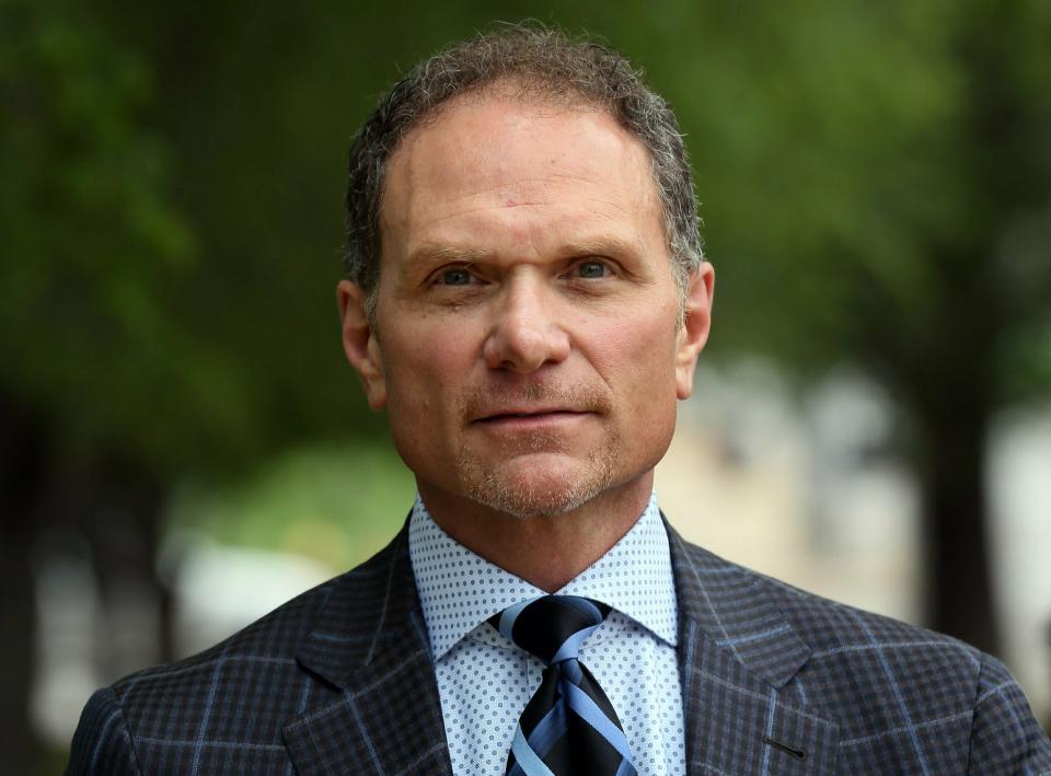 FILE - In this May 10, 2019 file photo businessman John Rallo leaves federal court in St. Louis. Rallo has admitted in federal court that he provided bribes as part of former St. Louis County Executive Steve Stenger's pay-to-play scheme, the fourth person to plead guilty in connection with the crime. Rallo pleaded guilty Tuesday, June 16, 2019 to three counts of bribery. (David Carson/St. Louis Post-Dispatch via AP)