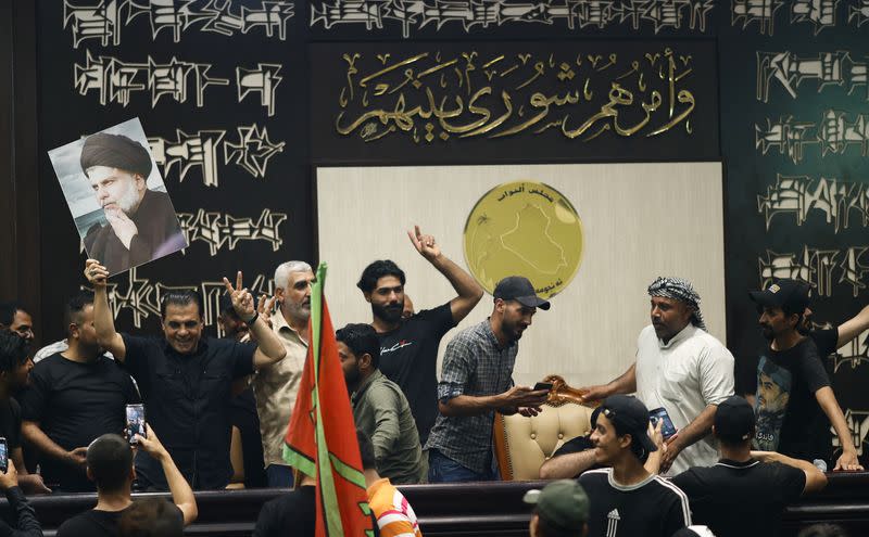 Supporters of Iraqi Shi'ite cleric Moqtada al-Sadr gather during a sit-in, inside the parliament building amid political crises in Baghdad