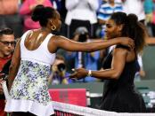 Mar 12, 2018; Indian Wells, CA, USA; Venus Williams (USA) and Serena Williams (USA) hug after their third round match in the BNP Paribas Open at the Indian Wells Tennis Garden. Venus Williams won the match. Mandatory Credit: Jayne Kamin-Oncea-USA TODAY Sports