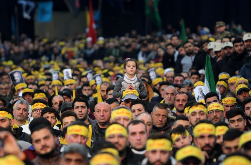 Lebanon's Hezbollah supporters attend a funeral ceremony rally to mourn Qassem Soleimani, head of the elite Quds Force, who was killed in an air strike at Baghdad airport, in Beirut's suburbs