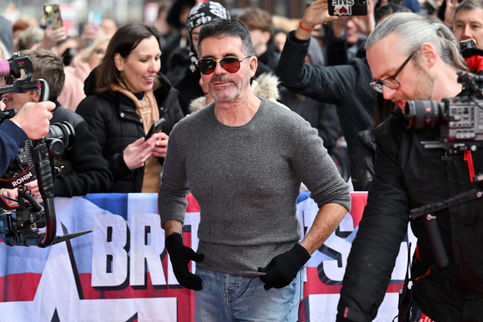 MANCHESTER, ENGLAND - FEBRUARY 09: Simon Cowell attends 