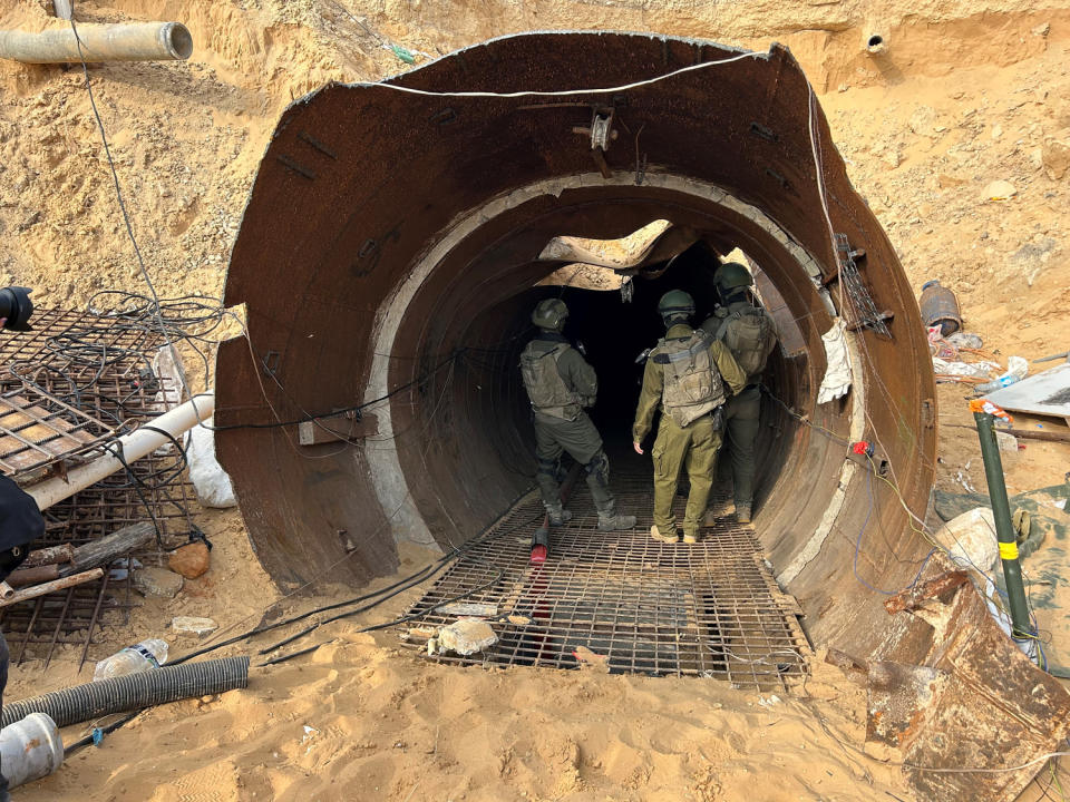 Israeli soldiers stand at the entrance of what the military says is the largest tunnel yet discovered in Gaza near the Erez crossing in the north of the enclave. (Josh Lederman / NBC News)