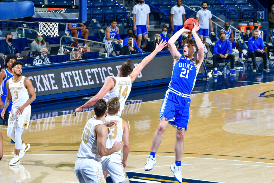 Dec 16, 2020; South Bend, Indiana, USA; Duke Blue Devils forward Matthew Hurt (21) shoots over Notre Dame Fighting Irish forward Nate Laszewski (14) in the first half at the Purcell Pavilion. 