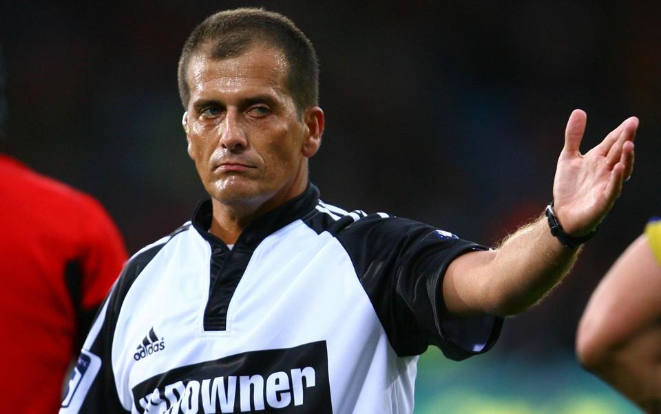 Referee Marius Jonker of South Africa signals a scrum during the round five Super Rugby match between the Highlanders and the Crusaders at Carisbrook on March 19, 2011 in Dunedin - GETTY IMAGES