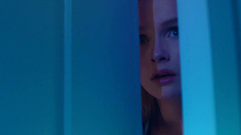 Babysitter Ashley (Olivia DeJonge) finds herself in a spot of bother. (Universal Pictures)