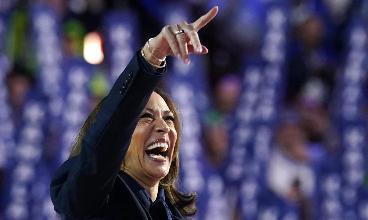 <span>Kamala Harris on stage at the Democratic National Convention.</span><span>Photograph: Kevin Lamarque/Reuters</span>