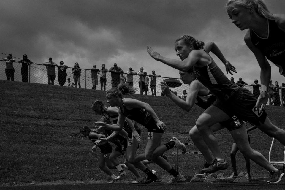 State authorities say the families living in and around Radford face exponentially greater health risks than residents in much of the rest of Virginia. Above, girls start in the 110-meter hurdles as track teams compete at Radford High School. (Photo: Ashley Gilbertson/VII Photo, special to ProPublica)