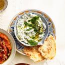 <p>Full-fat yogurt makes this otherwise light dip as creamy and flavorful as possible. </p><p>Get the <strong><a href="https://www.goodhousekeeping.com/food-recipes/a34975164/spinach-yogurt-dip-recipe/" rel="nofollow noopener" target="_blank" data-ylk="slk:Spinach and Yogurt Dip recipe;elm:context_link;itc:0;sec:content-canvas" class="link ">Spinach and Yogurt Dip recipe</a></strong>.</p>