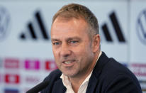 CORRECTS PHOTOGRAPHERS NAME --- German national soccer coach Hansi Flick addresses the media in Frankfurt, Germany, Thursday, Nov. 10, 2022 during the presentation of the German squad for the Qatar Soccer World Cup 2022. (AP Photo/Michael Probst)