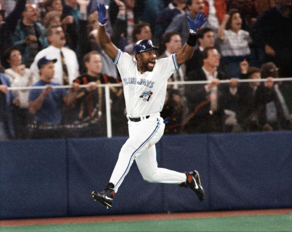 Joe Carter celebrates after lifting the Toronto Blue Jays to a walk-off win in Game 6 to win the 1993 World Series.