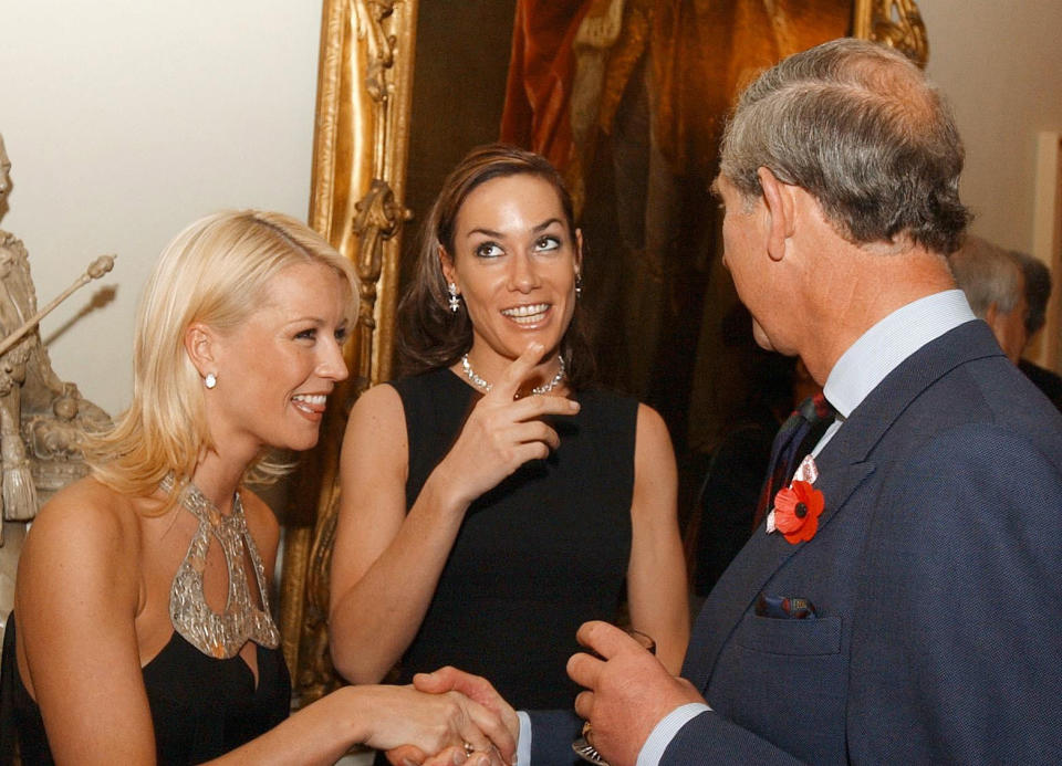Tara Palmer-Tomkinson with Denise Van Outen and Prince Charles in 2003. (PA)