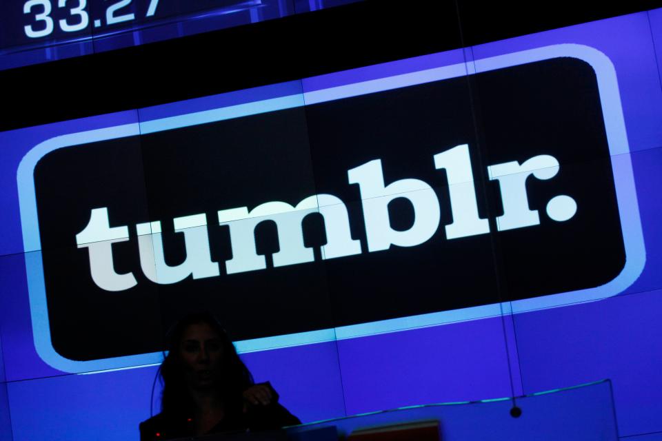 In this Thursday, July 11, 2013 photo, the Tumblr logo is displayed at Nasdaq, in New York. Yahoo paid $1.1 billion to buy the blogging site Tumblr in one of this year's most buzzed-about deals. Now, Tumblr is flaunting its hipster credentials with a first-ever breakdown of the year's hottest trends, topics and celebrities. The retrospective starts Tuesday, Dec. 3, 2013, with an exploration of 20 categories ranging from the most popular musical groups to the most interesting architecture of 2013. (AP Photo/Mark Lennihan) ORG XMIT: NYSB101