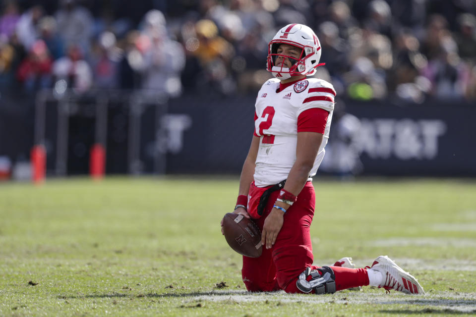 Nebraska quarterback Adrian Martinez (2) falls to his knees after failing to pick up a first down against Purdue during the second half of an NCAA college football game in West Lafayette, Ind., Saturday, Nov. 2, 2019. Purdue defeated Nebraska 31-27. (AP Photo/Michael Conroy)