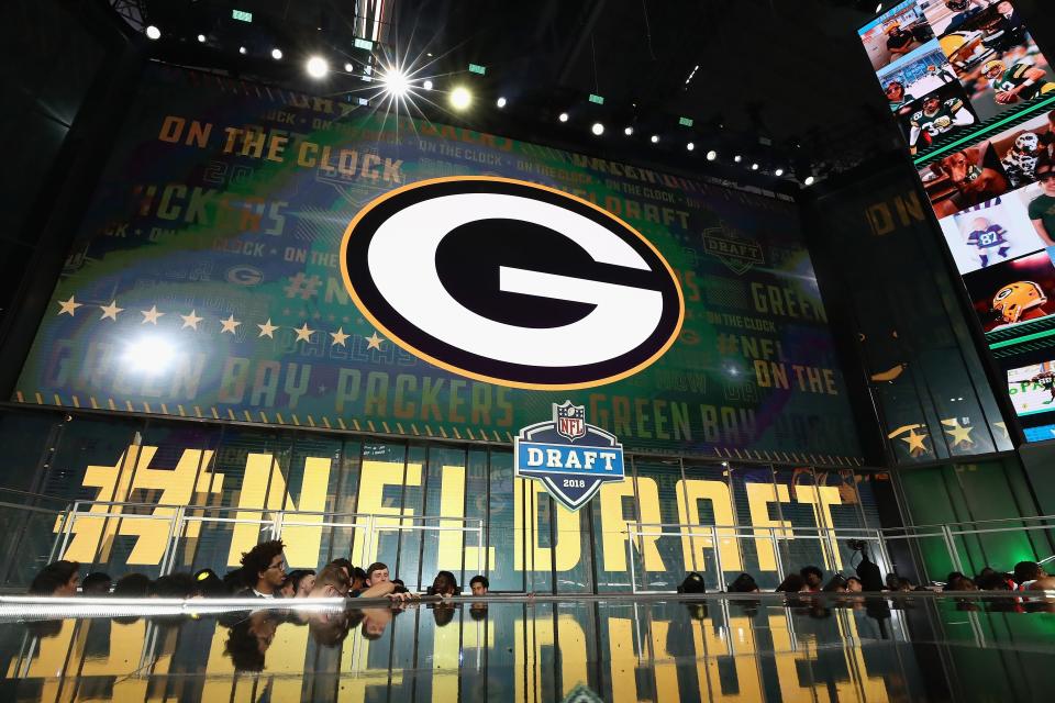 The Green Bay Packers logo is on a video board during the first round of the 2018 NFL draft.