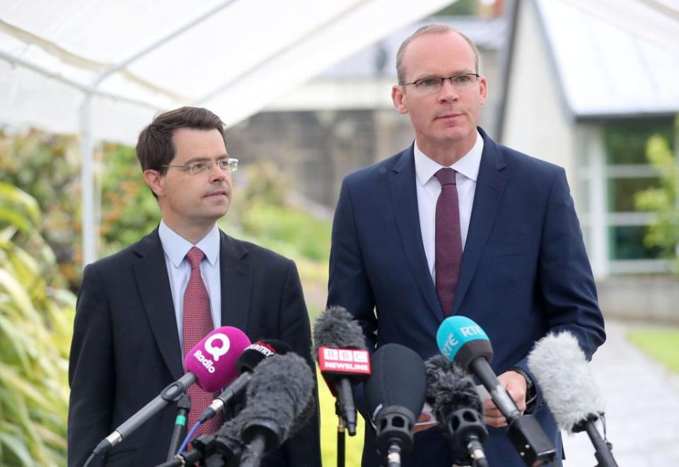 James Brokenshire with Irish Foreign Affairs Minister Simon Coveney (Niall Carson/PA) (PA Archive)